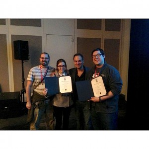 The Valencia team was all smiles at the Audio Engineering Society student competition in New York. From left, Valencia professor Joseph McBride, Valencia student Melodie Cros, competition director John Krivit and Valencia graduate Jonathan Luna.