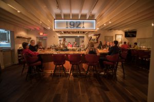 The bar is busy at 1921, the Mount Dora restaurant where Valencia grad Camilo Velasco is chef de cuisine.