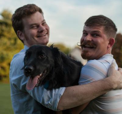 Tony and Alex Ray with dog.